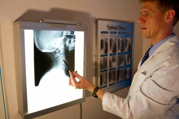 Dr. Erik Rosseland reviewing a neck X-ray